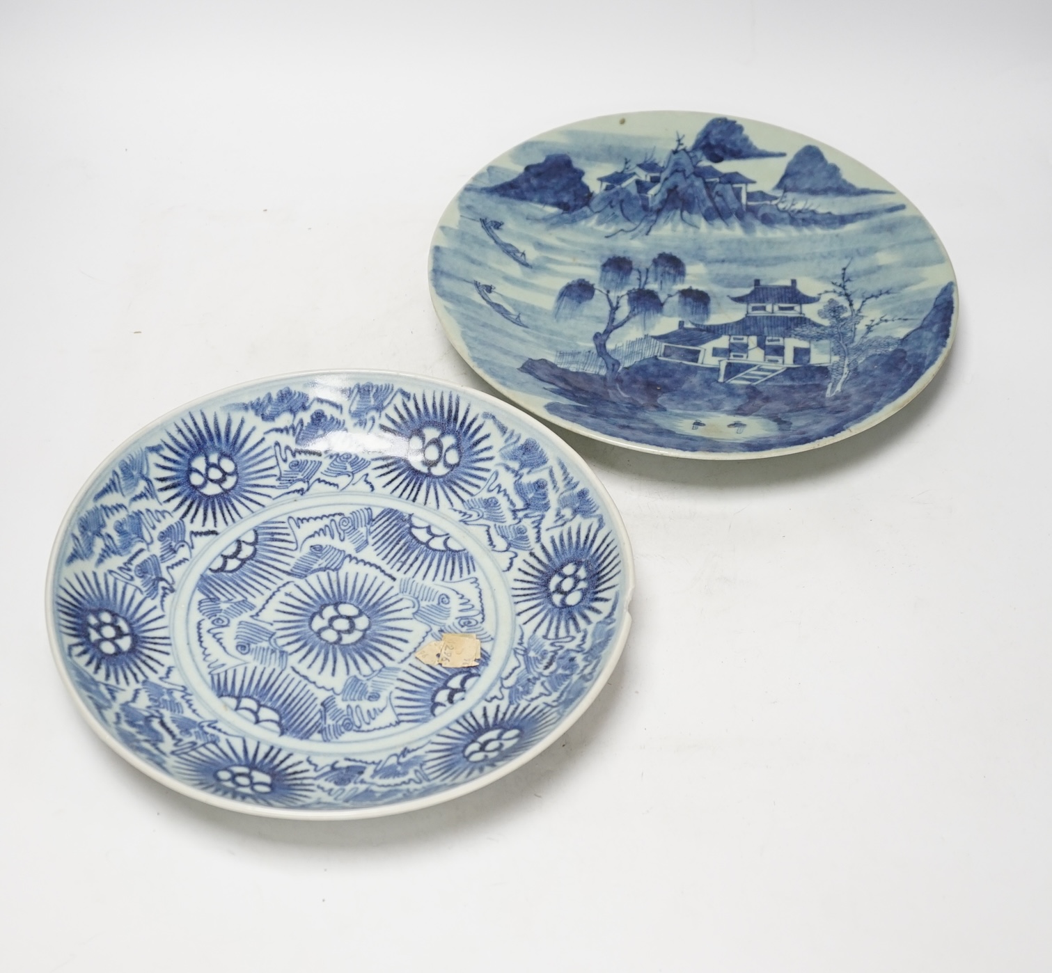 A 19th century Chinese celadon glazed blue and white landscape dish and a Diana Cargo dish, landscape dish 29.5cm diameter